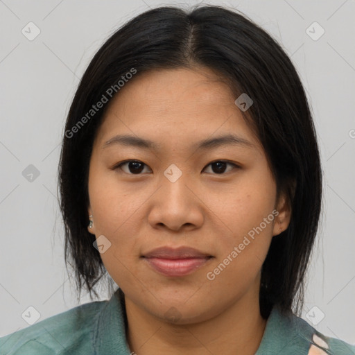 Joyful asian young-adult female with medium  brown hair and brown eyes