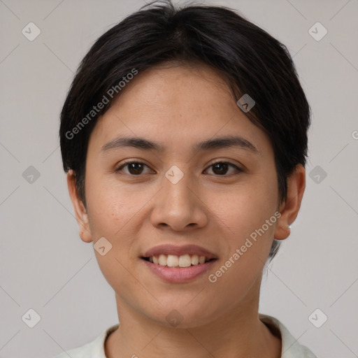 Joyful asian young-adult female with short  brown hair and brown eyes