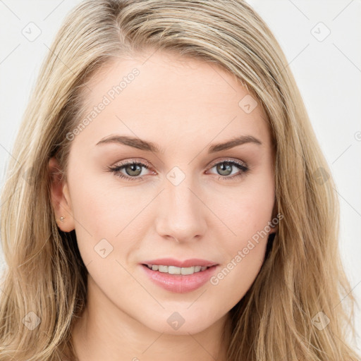 Joyful white young-adult female with long  brown hair and blue eyes