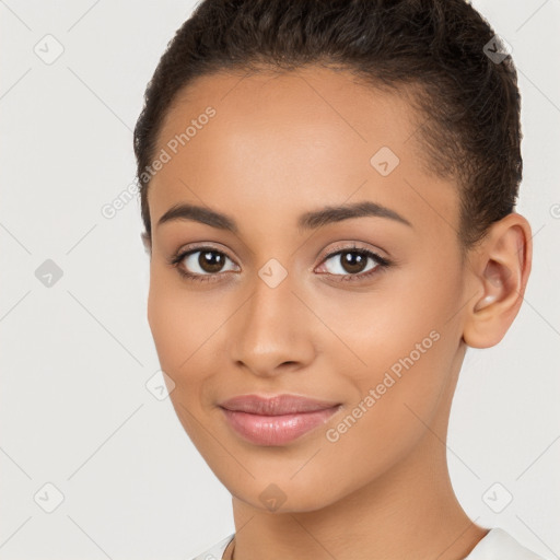 Joyful latino young-adult female with short  brown hair and brown eyes