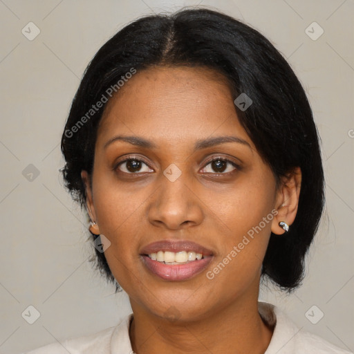 Joyful black young-adult female with medium  black hair and brown eyes