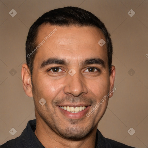 Joyful white adult male with short  brown hair and brown eyes