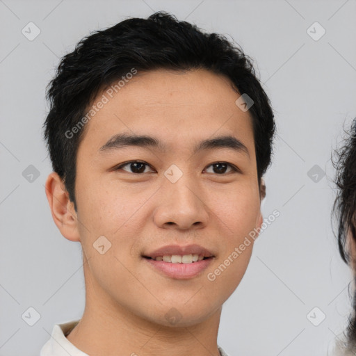 Joyful asian young-adult male with short  black hair and brown eyes