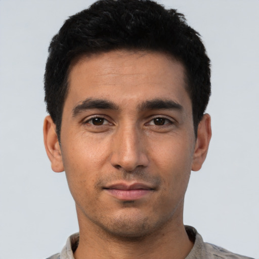 Neutral latino young-adult male with short  black hair and brown eyes