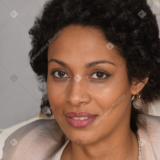 Joyful black young-adult female with long  brown hair and brown eyes