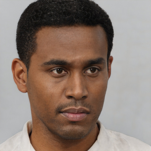 Neutral black young-adult male with short  brown hair and brown eyes
