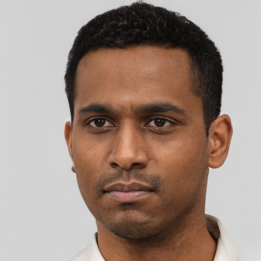 Neutral latino young-adult male with short  black hair and brown eyes