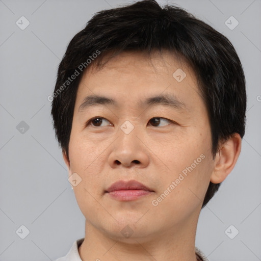 Neutral asian young-adult male with short  black hair and brown eyes