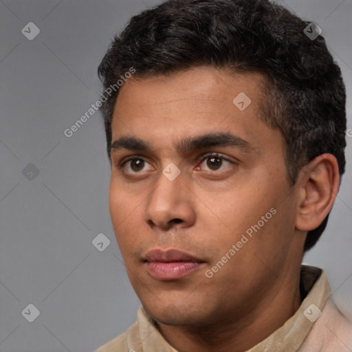 Neutral white young-adult male with short  black hair and brown eyes