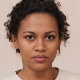 Neutral black young-adult female with short  brown hair and brown eyes