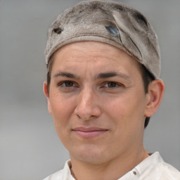 Joyful white adult female with short  brown hair and grey eyes