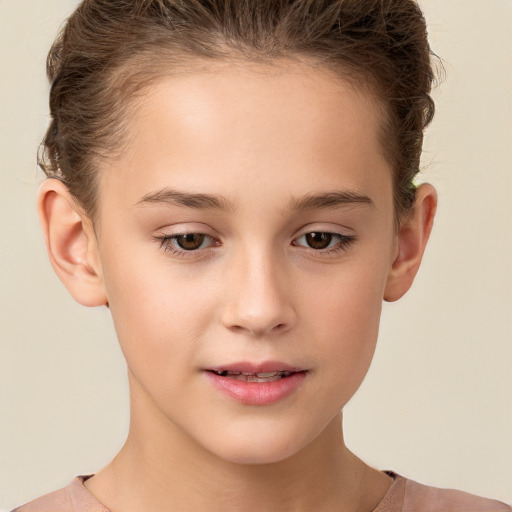 Joyful white child female with short  brown hair and brown eyes