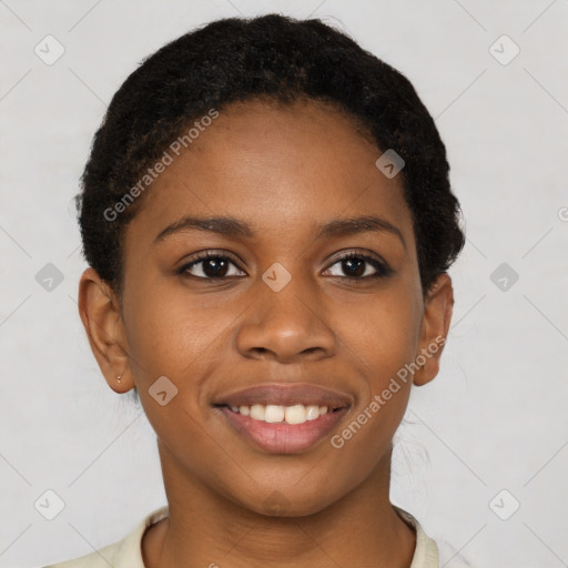 Joyful black young-adult female with short  brown hair and brown eyes