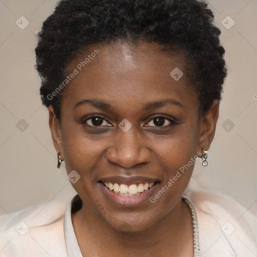 Joyful black young-adult female with short  brown hair and brown eyes