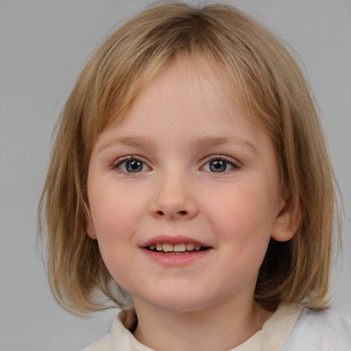 Joyful white child female with medium  brown hair and blue eyes