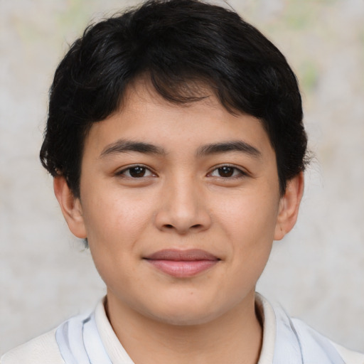 Joyful latino young-adult male with short  brown hair and brown eyes