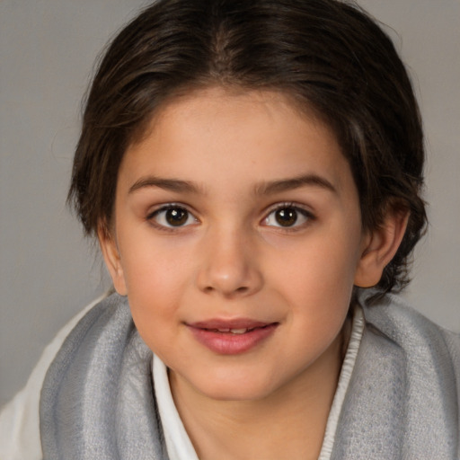 Joyful white child female with medium  brown hair and brown eyes