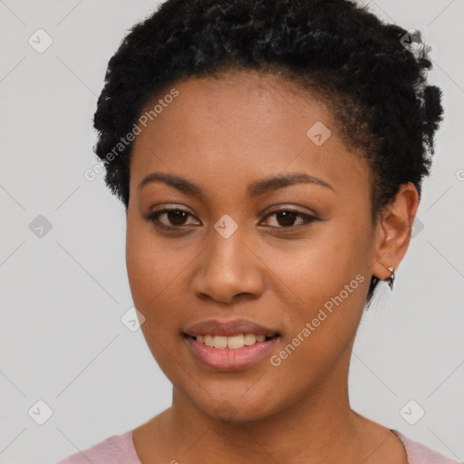 Joyful black young-adult female with short  black hair and brown eyes