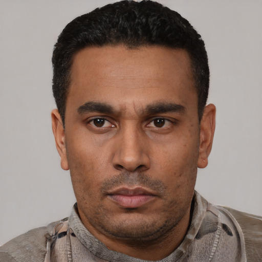 Neutral latino young-adult male with short  black hair and brown eyes