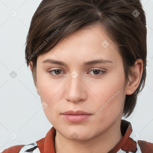 Neutral white young-adult female with short  brown hair and brown eyes