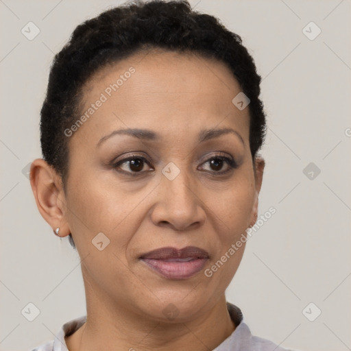 Joyful black adult female with short  brown hair and brown eyes