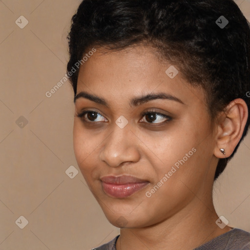 Joyful latino young-adult female with short  brown hair and brown eyes