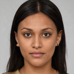 Neutral black young-adult female with long  brown hair and brown eyes