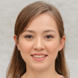 Joyful white child female with medium  brown hair and brown eyes