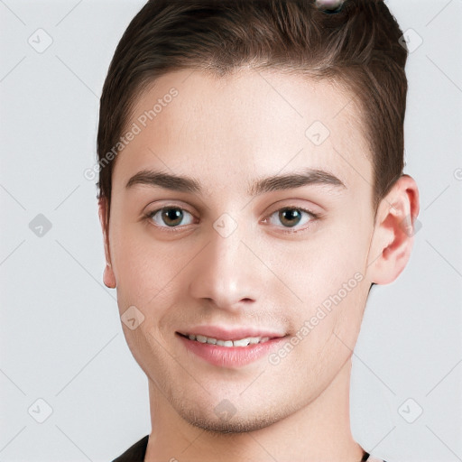 Joyful white young-adult male with short  brown hair and brown eyes