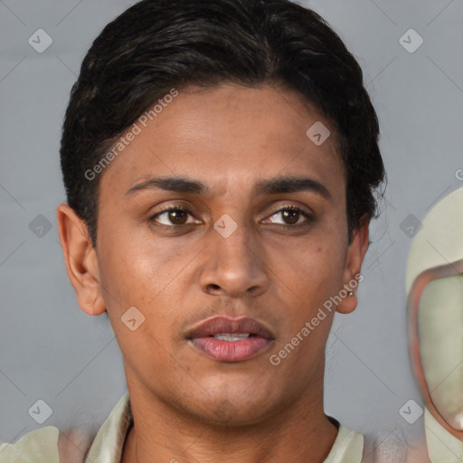 Joyful black young-adult male with short  brown hair and brown eyes