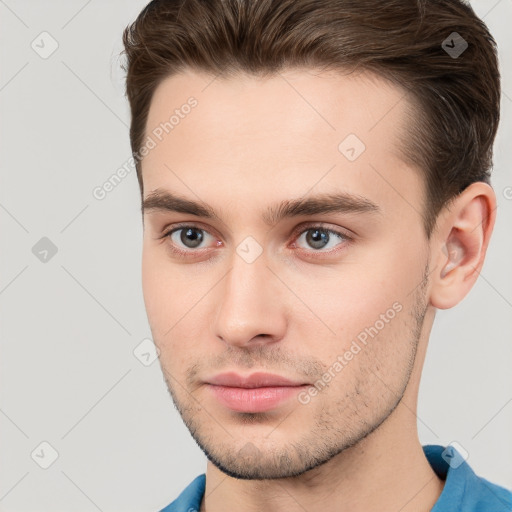 Neutral white young-adult male with short  brown hair and brown eyes