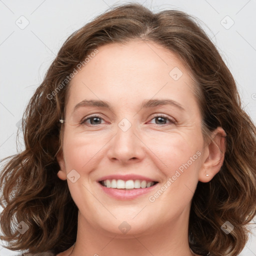 Joyful white young-adult female with medium  brown hair and green eyes