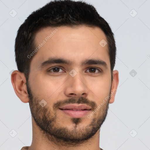 Joyful latino young-adult male with short  brown hair and brown eyes