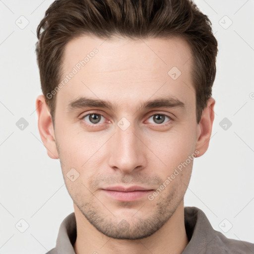 Neutral white young-adult male with short  brown hair and grey eyes