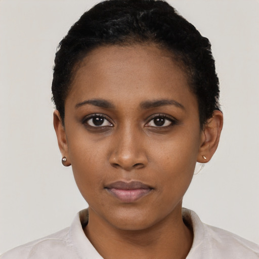 Neutral black young-adult female with short  black hair and brown eyes