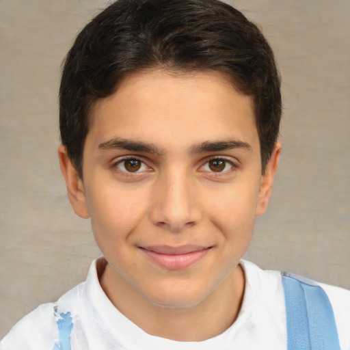 Joyful white child male with short  brown hair and brown eyes