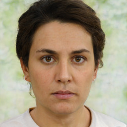 Neutral white young-adult female with short  brown hair and brown eyes