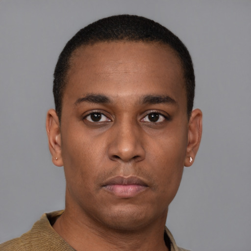 Neutral latino young-adult male with short  brown hair and brown eyes