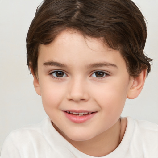 Joyful white child female with short  brown hair and brown eyes