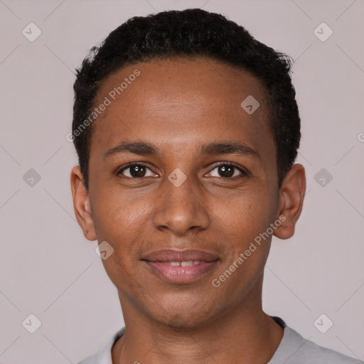 Joyful black young-adult male with short  black hair and brown eyes