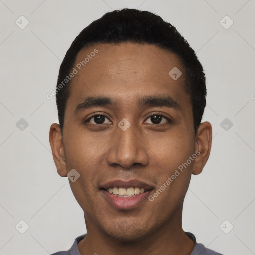 Joyful white young-adult male with short  black hair and brown eyes