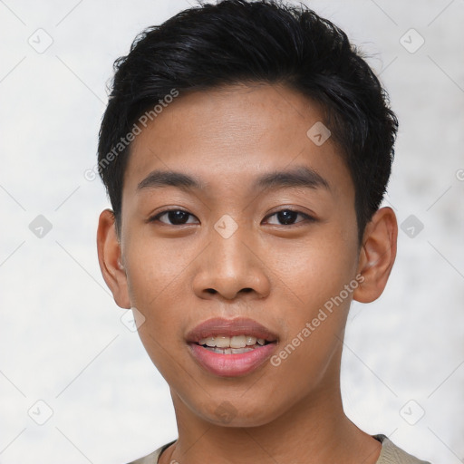 Joyful asian young-adult male with short  black hair and brown eyes