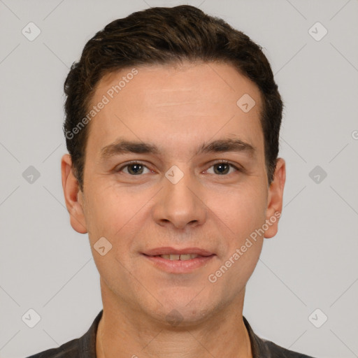 Joyful white young-adult male with short  brown hair and brown eyes