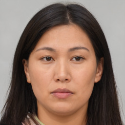 Neutral asian young-adult female with long  brown hair and brown eyes