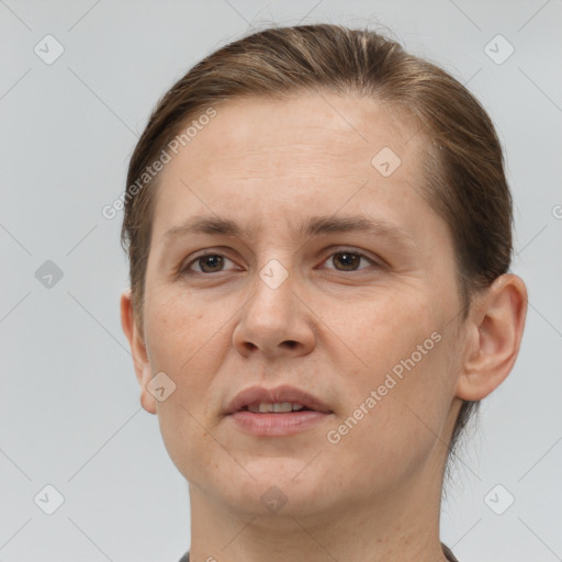 Joyful white adult female with short  brown hair and brown eyes