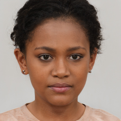 Neutral black young-adult female with short  brown hair and brown eyes