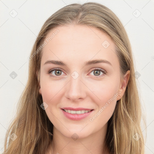 Joyful white young-adult female with long  brown hair and blue eyes