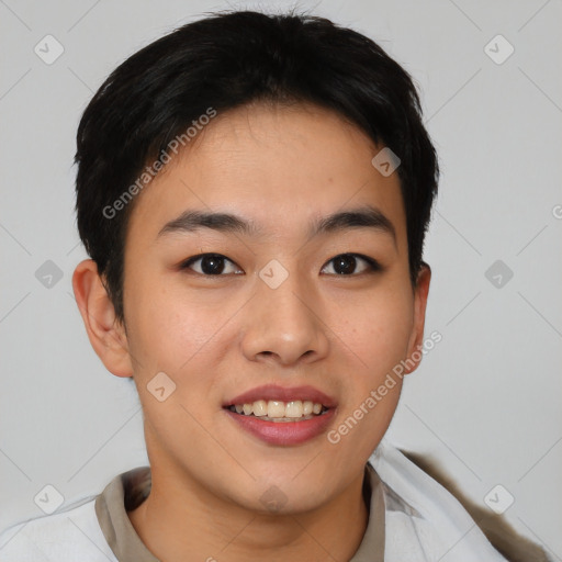 Joyful asian young-adult female with short  brown hair and brown eyes