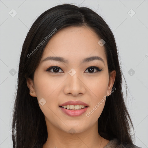 Joyful asian young-adult female with long  brown hair and brown eyes