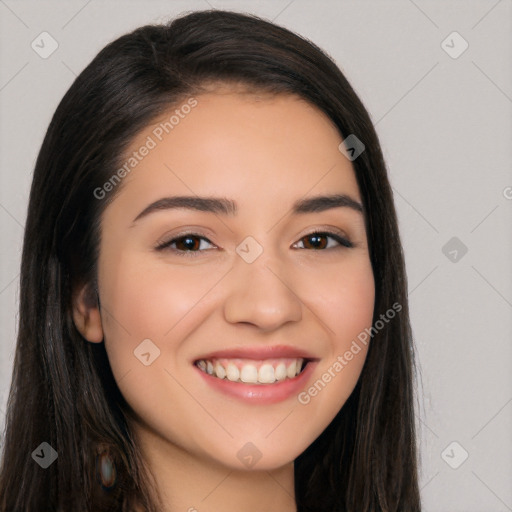 Joyful white young-adult female with long  black hair and brown eyes